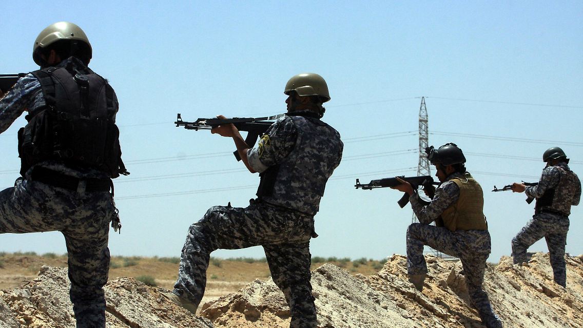 2014-06-16T184205Z_1114777464_GM1EA6H03L001_RTRMADP_3_IRAQ-SECURITY.JPG698049561904835973.jpg