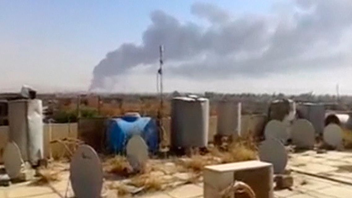 2014-06-18T131218Z_1598112664_GM1EA6I1M0901_RTRMADP_3_IRAQ-SECURITY-BAIJI.JPG6430683669667435972.jpg