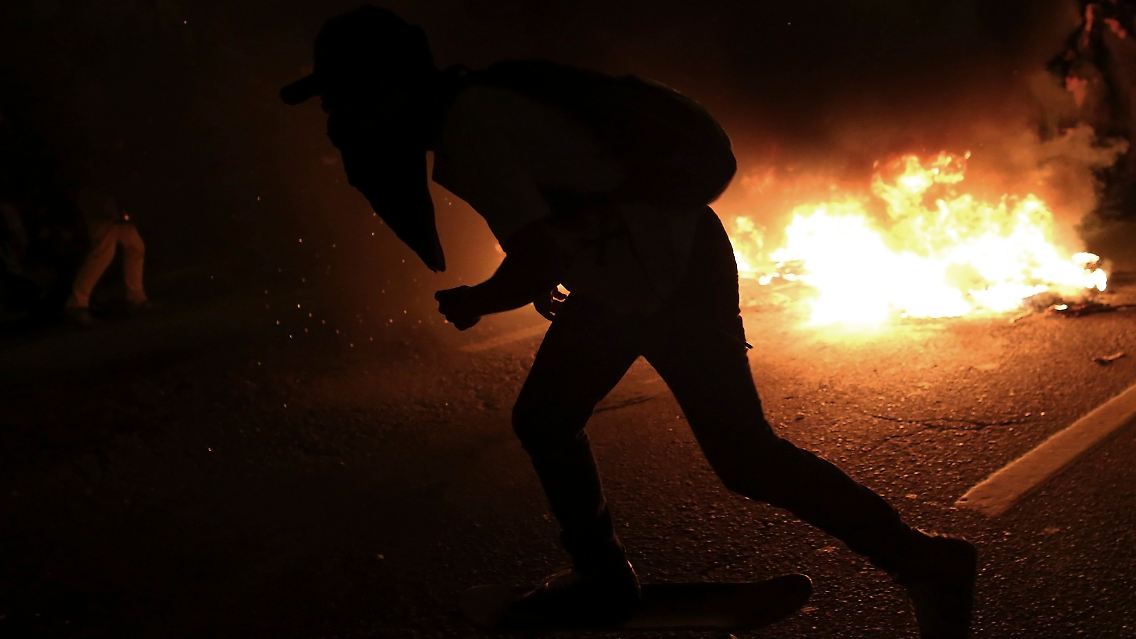 2014-06-20T003453Z_428668869_GM1EA6K0NRK01_RTRMADP_3_BRAZIL-WORLDCUP-PROTESTS.JPG7685584800003514112.jpg