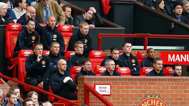 Demnächst vielleicht in Adidas-Sportsachen: Spieler und Verantwortliche von Manchester United.