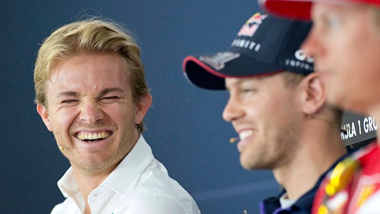 Guter Dinge: WM-Spitzenreiter Nico Rosberg (l.) und Formel-1-Weltmeister Sebastian Vettel.