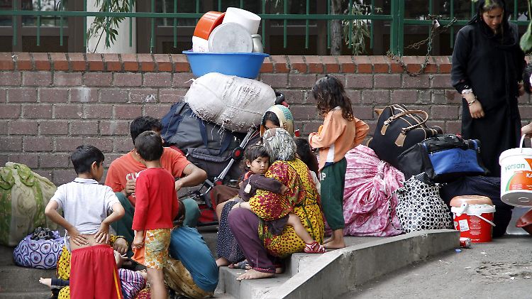 Syrische Flüchtlinge in einem Park im Istanbuler Bezirk Fatih.