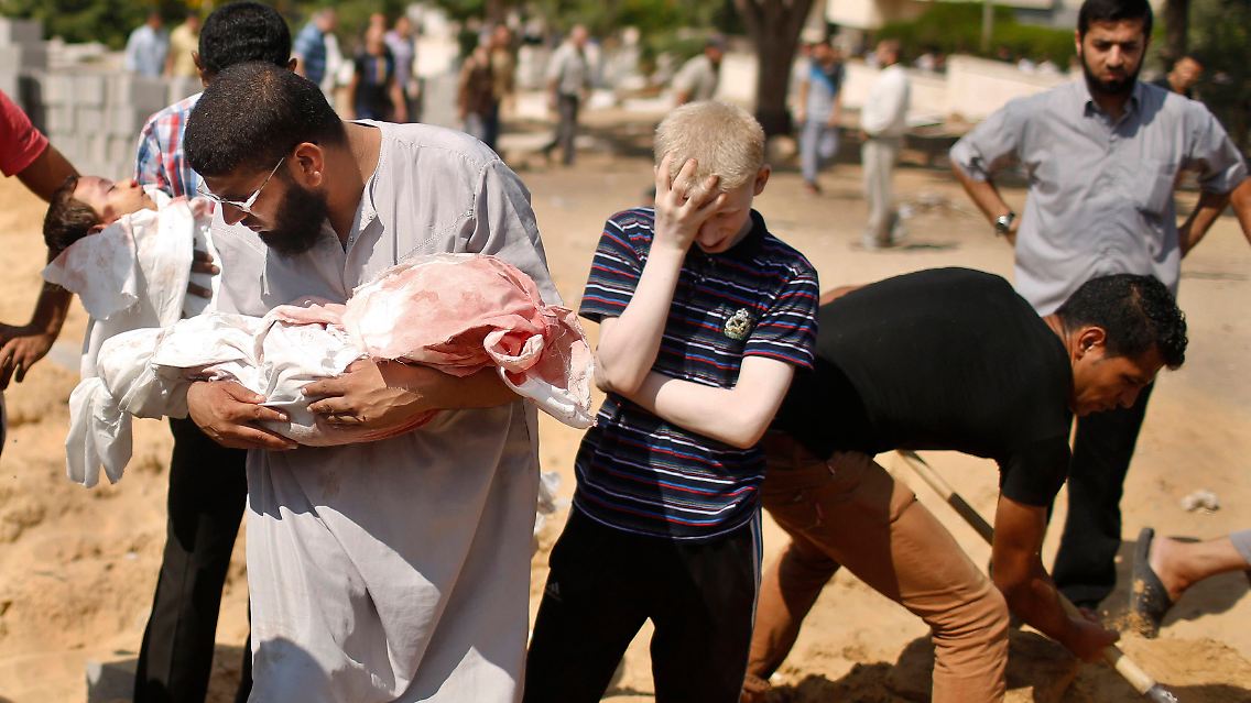 2014-07-24T081848Z_604564588_GM1EA7O18RF01_RTRMADP_3_MIDEAST-GAZA.JPG61715199770823417.jpg