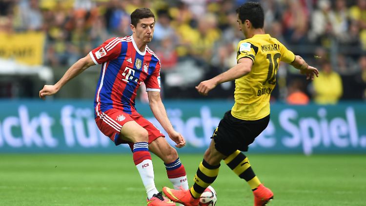 Haben wohl beide ihren Stammplatz sicher: Robert Lewandowski und Henrikh Mkhitaryan im direkten Duell.