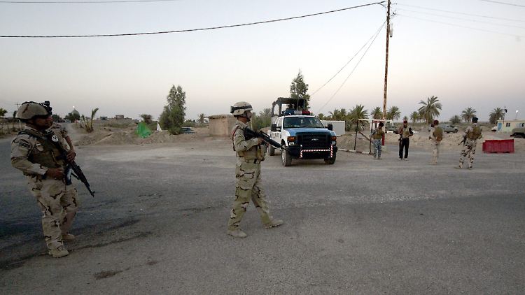 Irakische Soldaten in Saddam Husseins Heimatort Audscha.