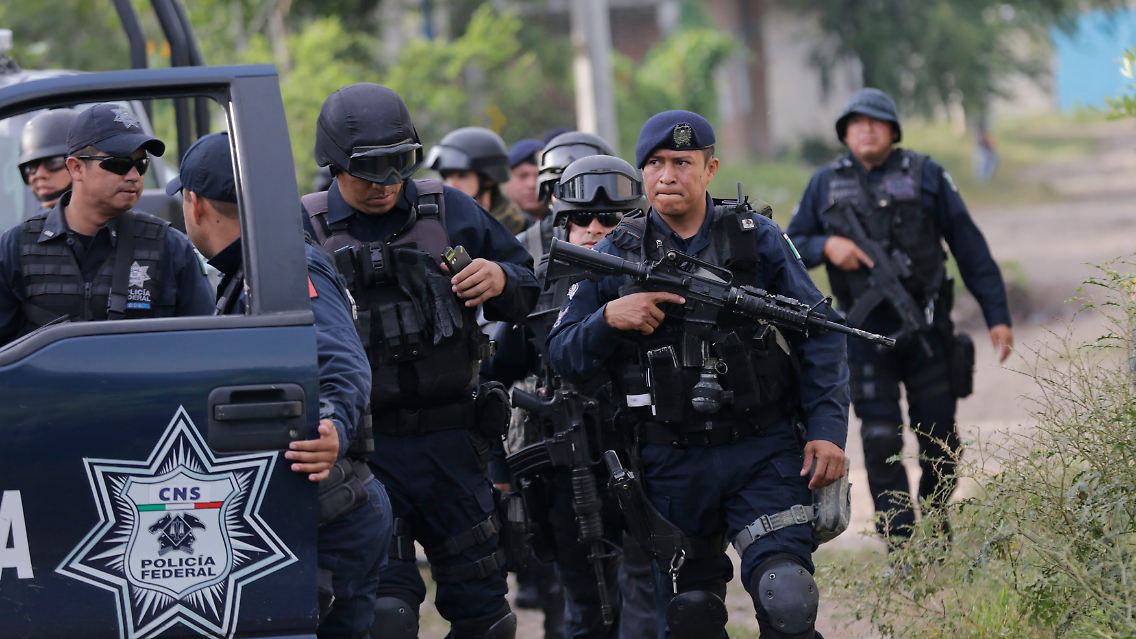 2014-10-10T153302Z_197873102_GM1EAAA1TCY01_RTRMADP_3_MEXICO-VIOLENCE.JPG3447386654604424349.jpg