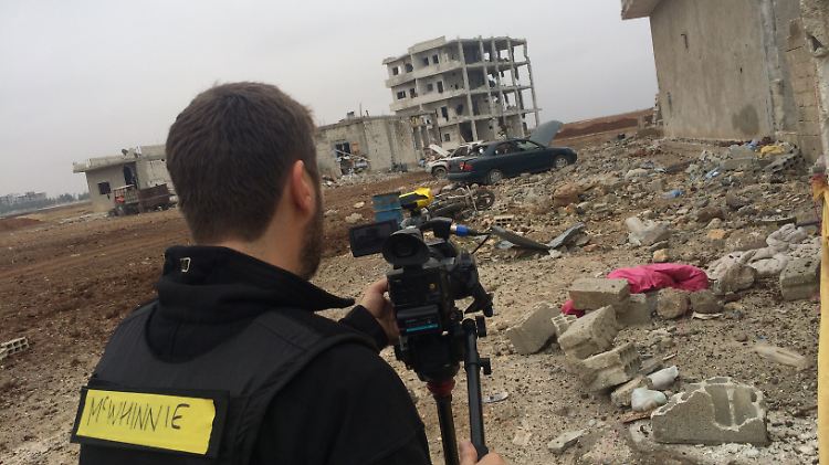 CNN Kameramann Scott McWhinnie zeichnet die Zerstörung in Kobane auf.