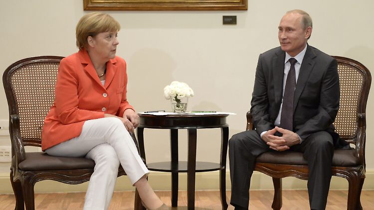 Merkel und Putin im Juli in Rio de Janeiro.