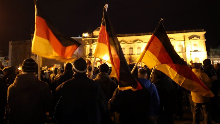 Haben ihren Sündenbock gefunden: Pegida-Demonstranten in Dresden.
