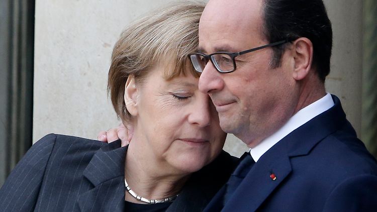 Die Franzosen würdigen Hollandes Krisenmanagement - zum Trauermarsch war auch Kanzlerin Angela Merkel gekommen.