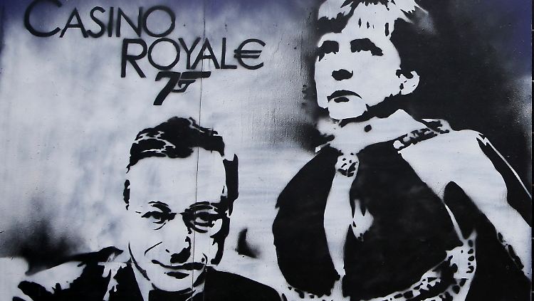 Ein Graffity mit den Konterfeis von EZB-Chef Draghi und Bundeskanzlerin Merkel. Deutschland ist vehement gegen eine Vergemeinschaftung der Risiken in der Eurozone.