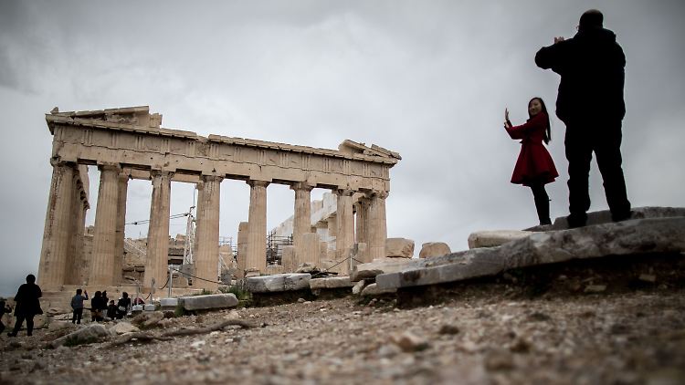 Für Touristen ist Athen noch immer eine wundervolle Stadt - selbst im Regen.