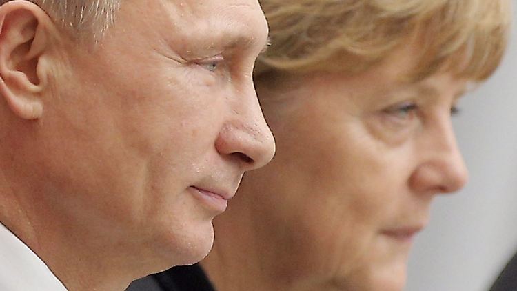 Putin und Merkel im "Palast der Unabhängigkeit" in Minsk.