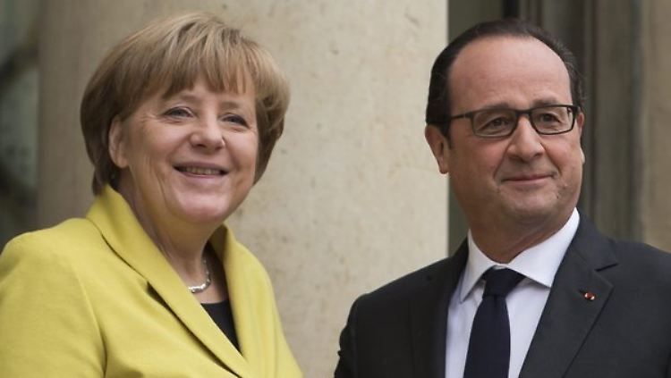 Bundeskanzlerin Merkel und Frankreichs Staatschef Hollande wollen Athen im Euro halten.