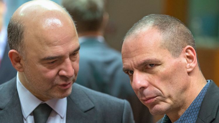 Währungskommissar Pierre Moscovici (l) und Athens Kassenwart Yanis Varoufakis.