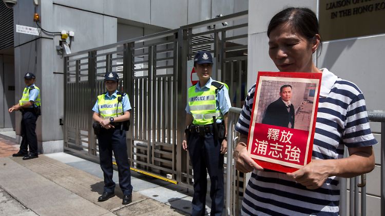 Fast tausend Bürgerrechtler wurden 2014 inhaftiert. Aktivisten in China demonstrieren regelmäßig für die Freilassung einzelner von ihnen.