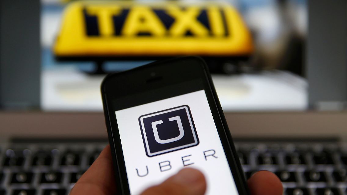 2015-03-18T124103Z_948346550_LR2EB3I0Z84VT_RTRMADP_3_UBER-GERMANY.JPG7117785612388793519.jpg
