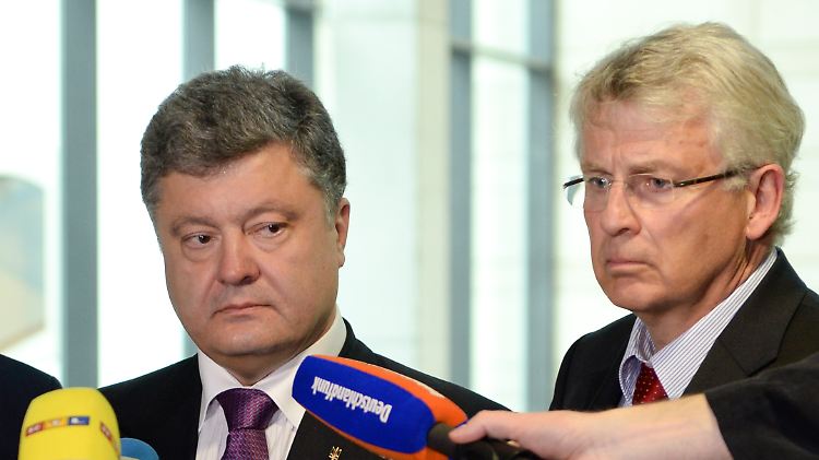 Wellmann (r) mit dem ukrainischen Präsidenten Petro Poroschenko 2014 in Berlin.