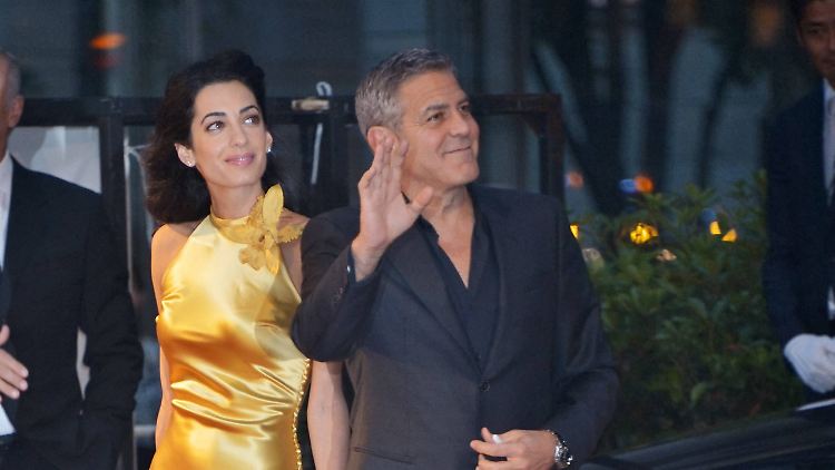 Denken über Kinder nach: Amal und George Clooney.