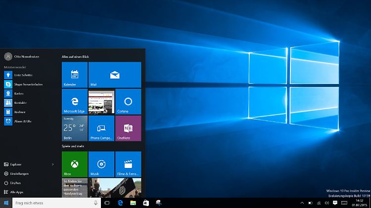 Windows 10 mit blauem Hero-Hintergrund und Edge-Kachel im Menü.