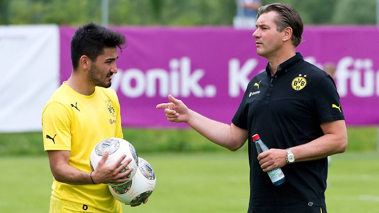 Na siehste, ist doch alles wieder gut in Dortmund. Ilkay Gündogan (l.) und Michael Zorc haben sich auf eine Vertragsverlängerung des Nationalspielers beim BVB geeinigt.