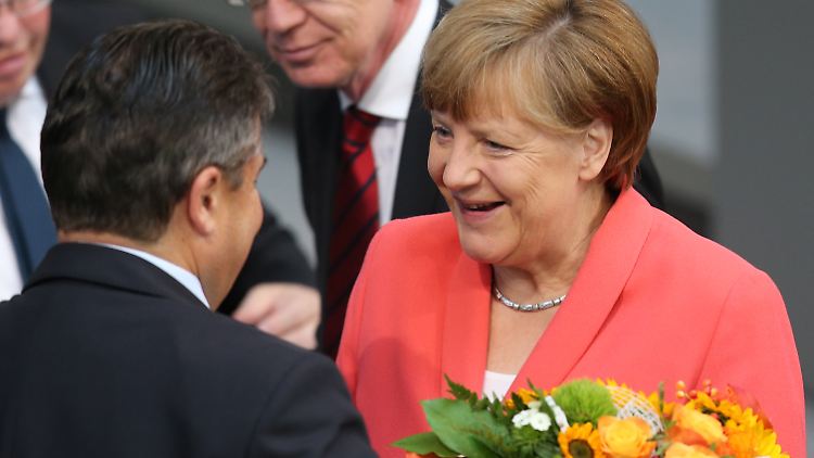 Blumen für die Kanzlerin.