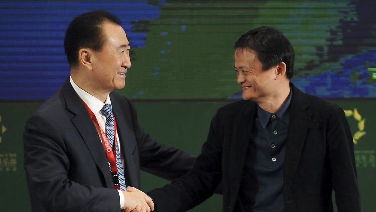 Wang Jianlin (l.) und Jack Ma: Mal eben um vier Milliarden Dollar leichter.