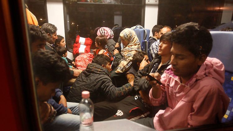 Flüchtlinge auf dem Weg von Ungarn nach Deutschland.