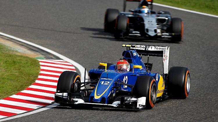 Fahrer von Sauber (vorne) und Force India (hinten) beim Grand Prix in Suzuka.