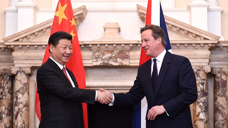 Der britische Premier David Cameron und Chinas Präsident Xi Jinping sind sich im Atomdeal einig.