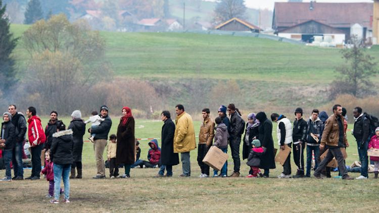 Flüchtlinge an der deutsch-österreichischen Grenze.