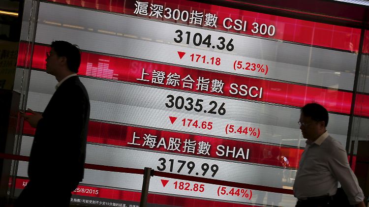 Börsentafel in Hongkongs Finanzdistrikt: China treibt die Anti-Korruptions-Kampagne im Finanzsektor voran.