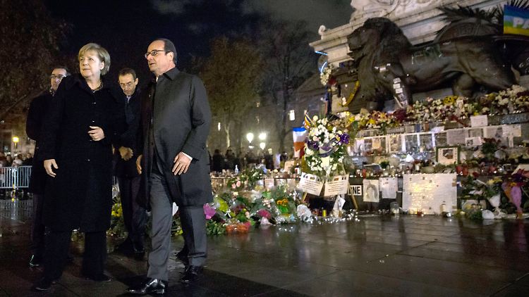 Merkel und Hollande beim Gedenken an die Opfer der Terroranschläge in Paris.