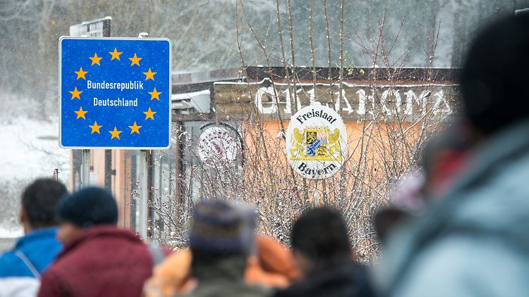 Flüchtlinge an der deutschen Grenze.