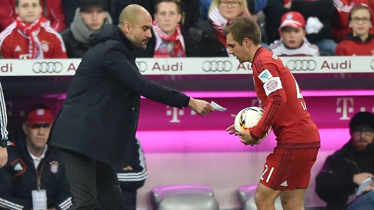 Hier steht alles drauf: Josep Guardiola und sein Kapitän Philipp Lahm.