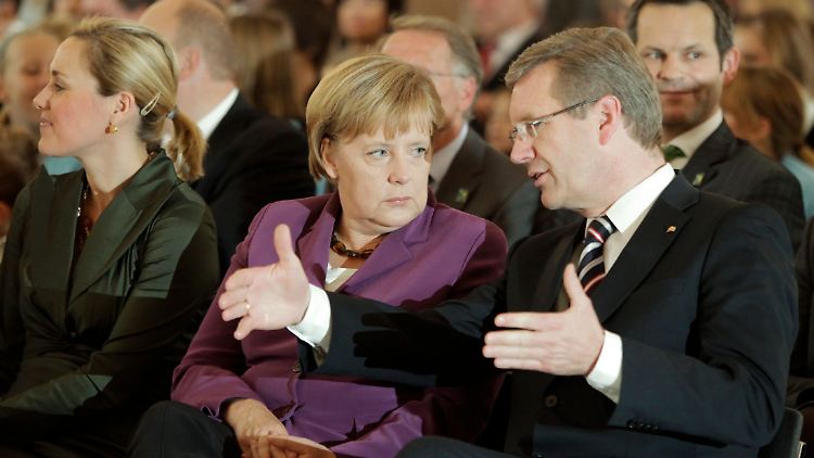 Harmonie im Schloss Bellevue: Kanzlerin und Präsident am Dienstag bei der Verleihung diverser Auszeichnungen an die deutsche Fußball-Nationalmannschaft.