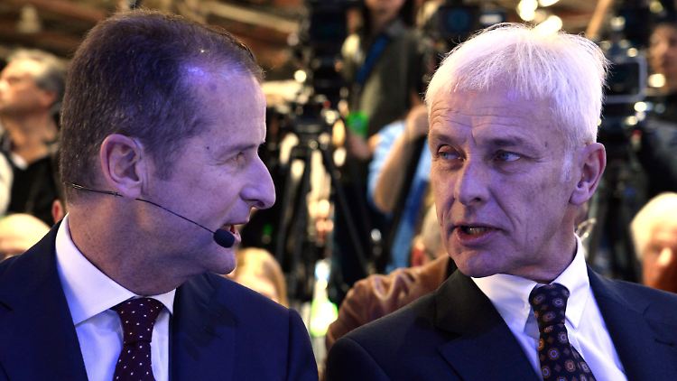 Herbert Diess (links) will die Kernmarke aus dem Tal führen. Sein Chef Matthias Müller stützt ihn.