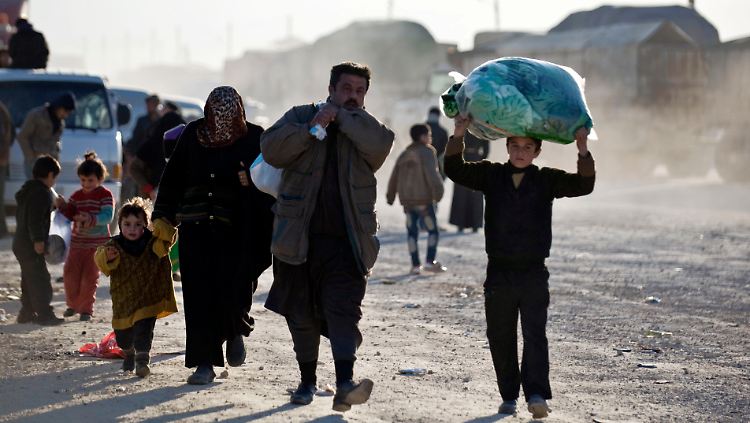 Flüchtlinge an der syrisch-türkischen Grenze.