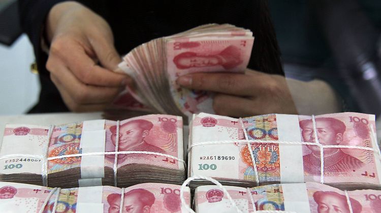 Eine gezielte Kurssenkung des Yuan könnte den Abwertungsdruck nehmen.