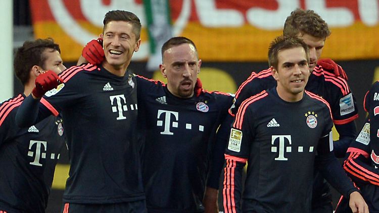 In Wolfsburg am Samstag haben sie schon ein wenig vorgefeiert: Robert Lewandowski, Franck Ribéry, Thomas Müller - und Philipp Lahm.
