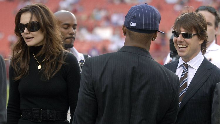 Katie Holmes (l.) mit Jamie Foxx (M.) und Tom Cruise (r.) im Jahr 2006. 