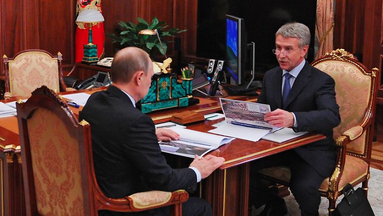 An den Schalthebeln der Macht: Nowatek-Chef Michelson bei einem Treffen mit Präsident Putin im Jahr 2014.
