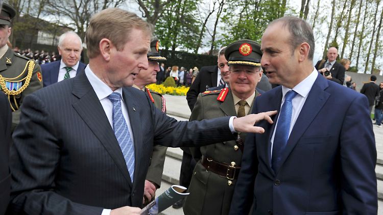 Die Partei des bisherigen irischen Regierungschefs Enda Kenny (l.), Fine Gael, bekommt von Micheal Martins (r.) Partei Fianna Fáil die Unterstützung für eine Minderheitsregierung.