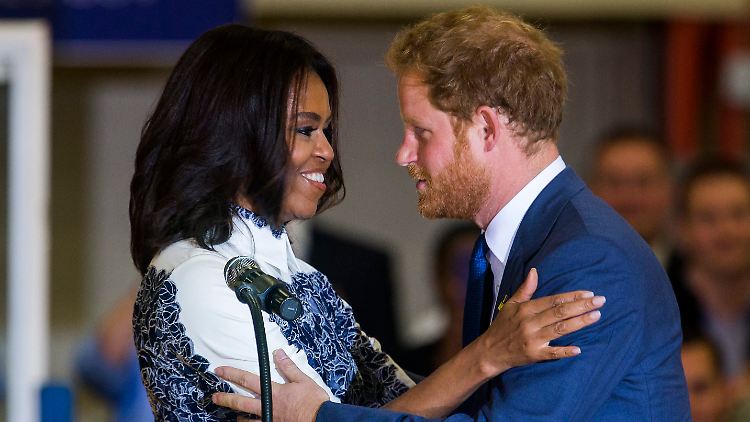 Alles für den guten Zweck: Mit der Unterstützung der First Lady wirbt Prinz Harry für einen internationalen Sportwettbewerb für kriegsversehrte Soldaten.