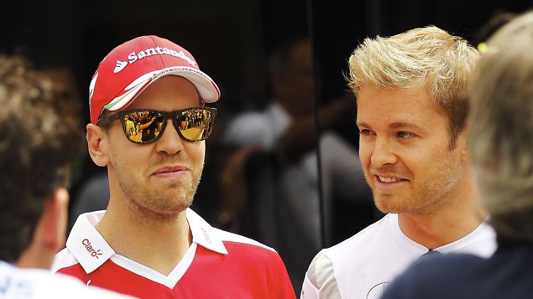 Bald Kollegen? Ferrari-Pilot Vettel (l.) und Mercedes-Fahrer Rosberg.