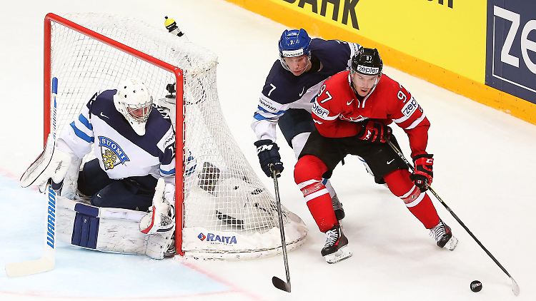 Connor McDavid, Esa Lindell und Mikko Koskinen.
