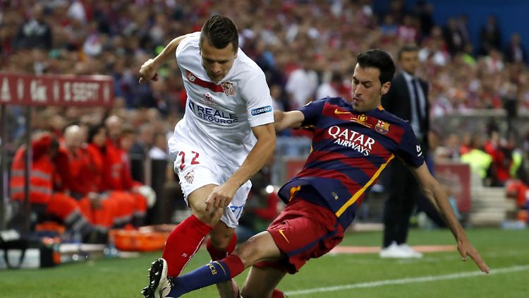 Busquets (r.) gewann mit Barcelona bereits 23 Titel, darunter sechs Mal die Primera División und drei Mal die Champions League.