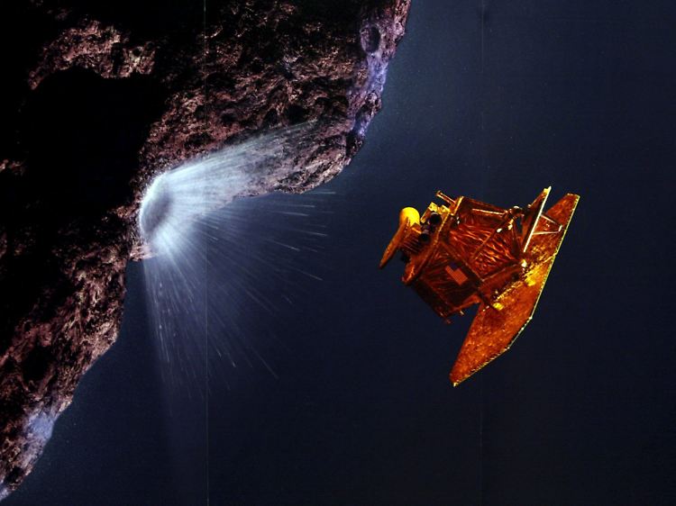 Die Illustration zeigt wie die US-Raumsonde "Deep Impact" einen Kometen beschießt.