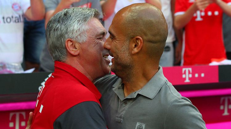 Ein herzliches Hallo: Carlo Ancelotti begrüßt seinen Vorgänger Josep Guardiola.