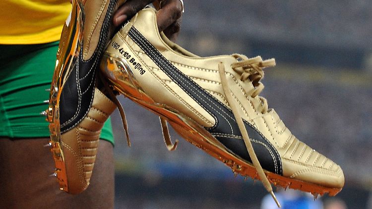 Usain Bolt lief 2008 in Peking in goldenen Schuhen zu Gold - das stärkt die Marke Puma indirekt.